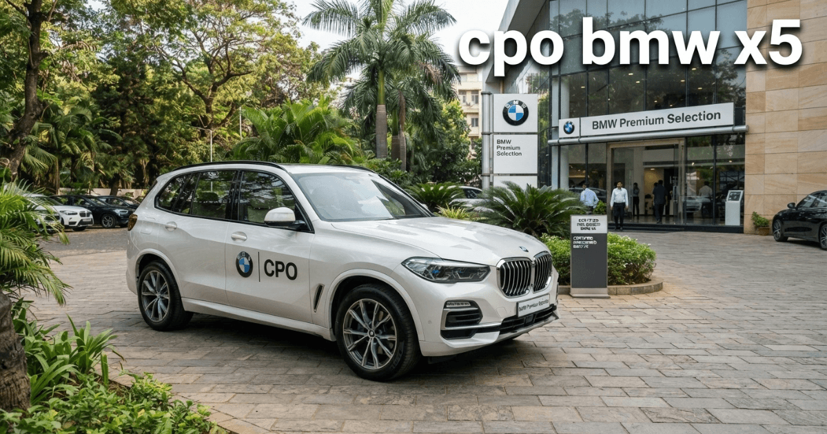 Silver CPO BMW X5 SUV driving on highway